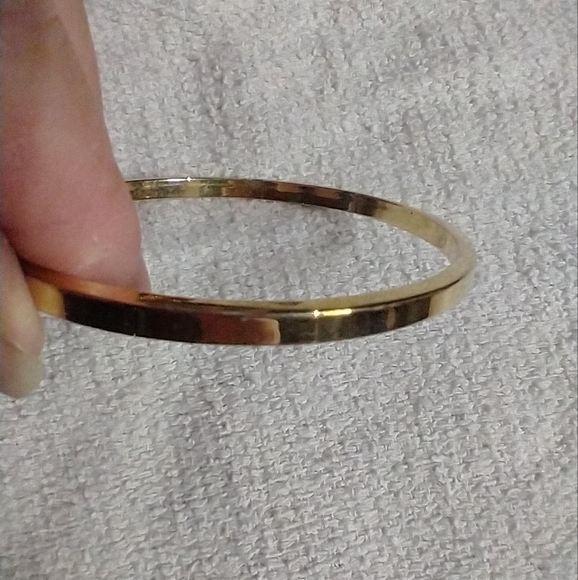 Goldtone Bangle bracelet solid 2.5 i.d. - Picture 1 of 2